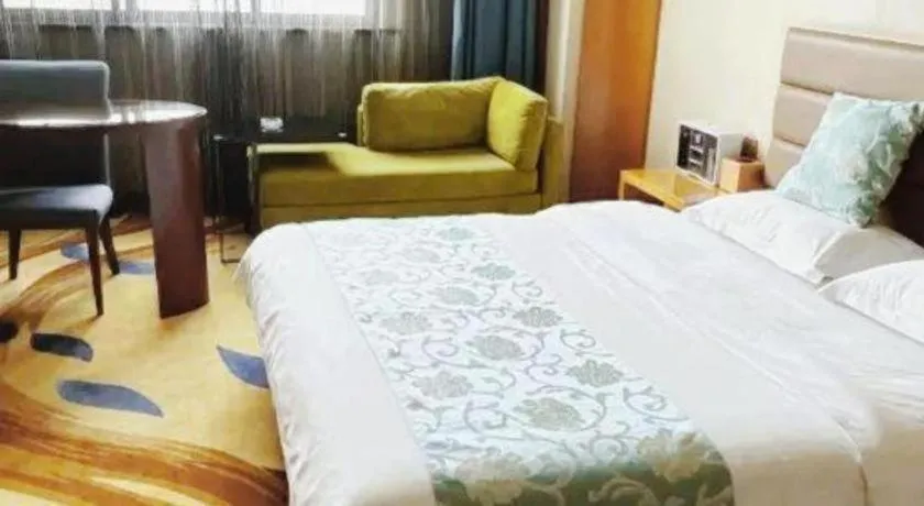 Bed in Ramada by Wyndham Taixing