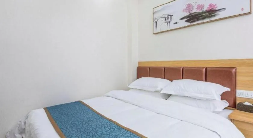 Bed in Guilin Wanjing Hotel