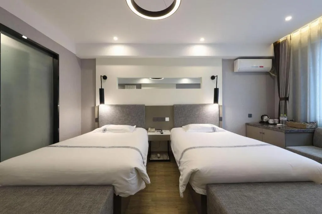 Bed in Urban Garden Hotel Chengyang District Government Liuting Airport