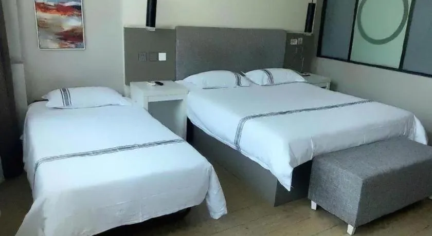 Bed in Urban Garden Hotel Chengyang District Government Liuting Airport