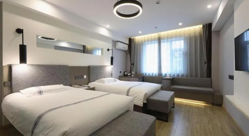 Bed in Urban Garden Hotel Chengyang District Government Liuting Airport