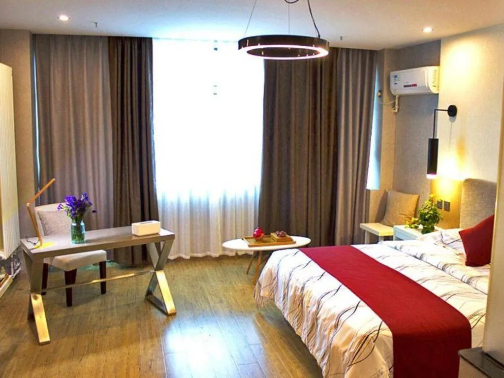 Bed in Urban Garden Hotel Chengyang District Government Liuting Airport