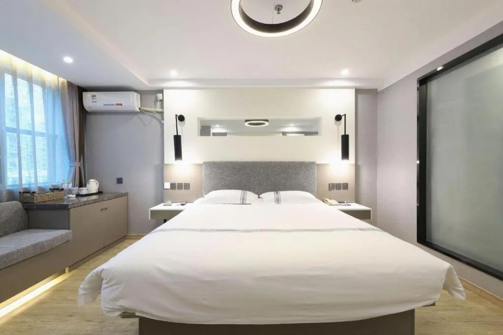 Bed in Urban Garden Hotel Chengyang District Government Liuting Airport