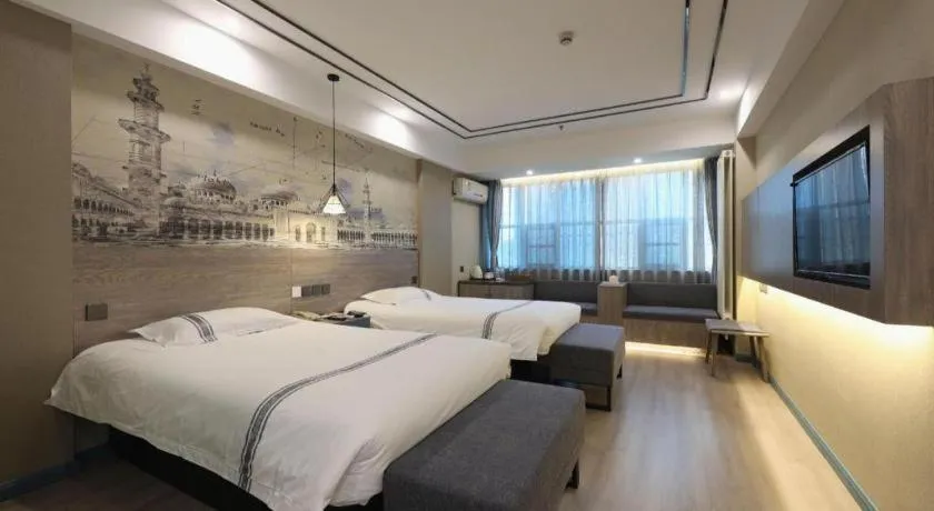 Bed in Urban Garden Hotel Chengyang District Government Liuting Airport
