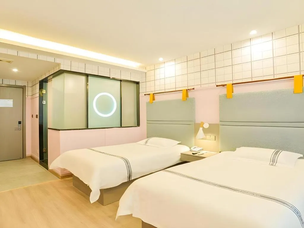 Bed in Urban Garden Hotel Chengyang District Government Liuting Airport