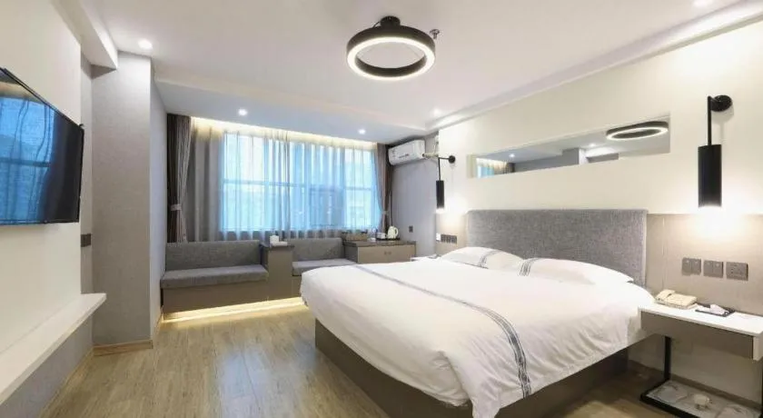 Bed in Urban Garden Hotel Chengyang District Government Liuting Airport