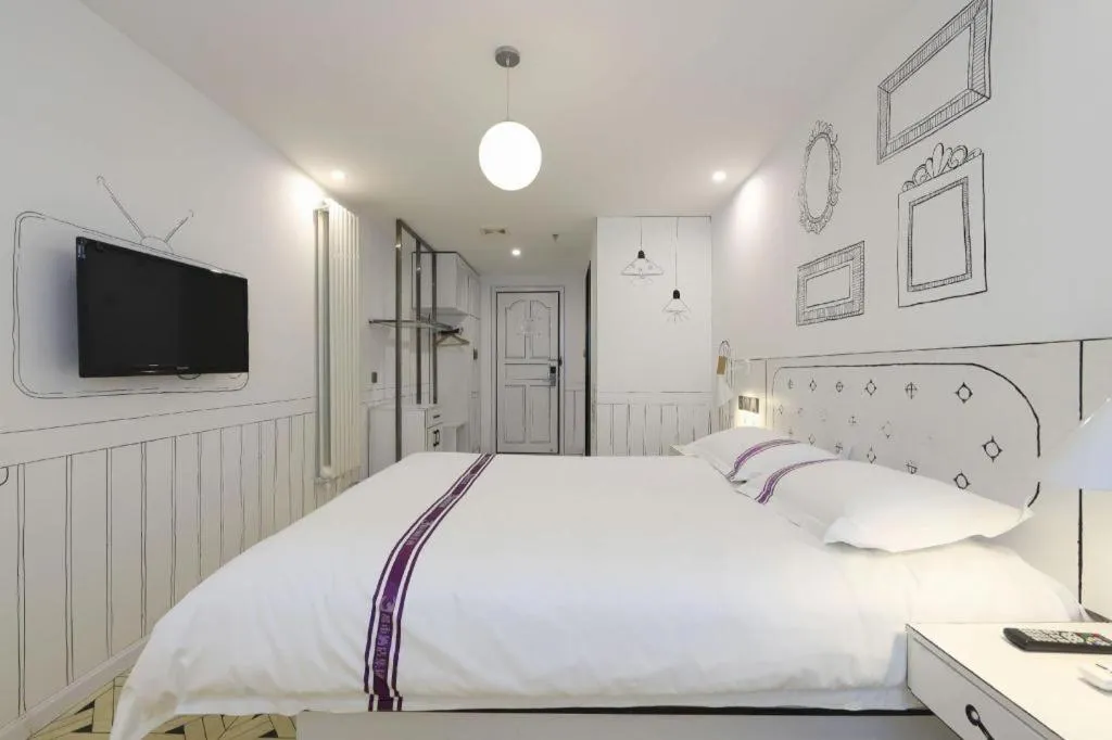 Bed in Urban Garden Hotel Chengyang District Government Liuting Airport