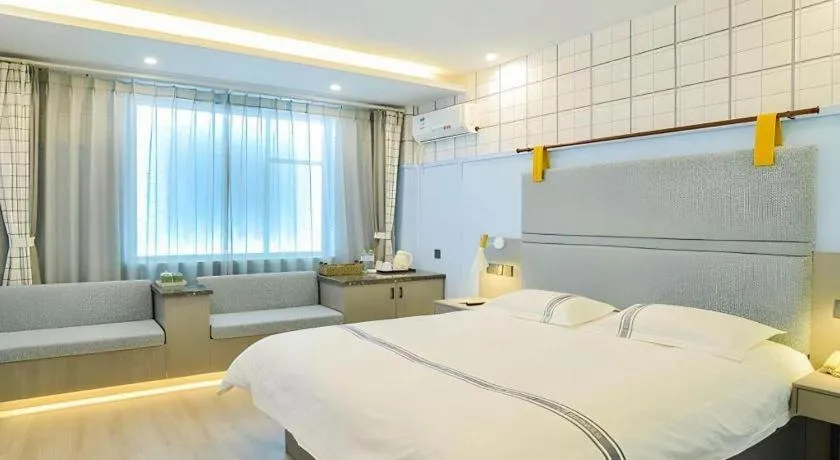 Bed in Urban Garden Hotel Chengyang District Government Liuting Airport