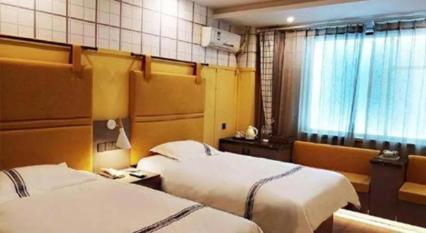 Bed in Urban Garden Hotel Chengyang District Government Liuting Airport