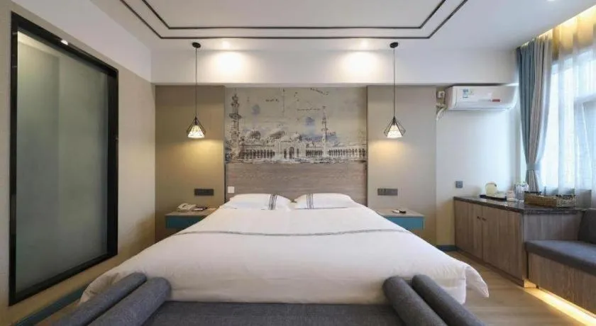 Bed in Urban Garden Hotel Chengyang District Government Liuting Airport