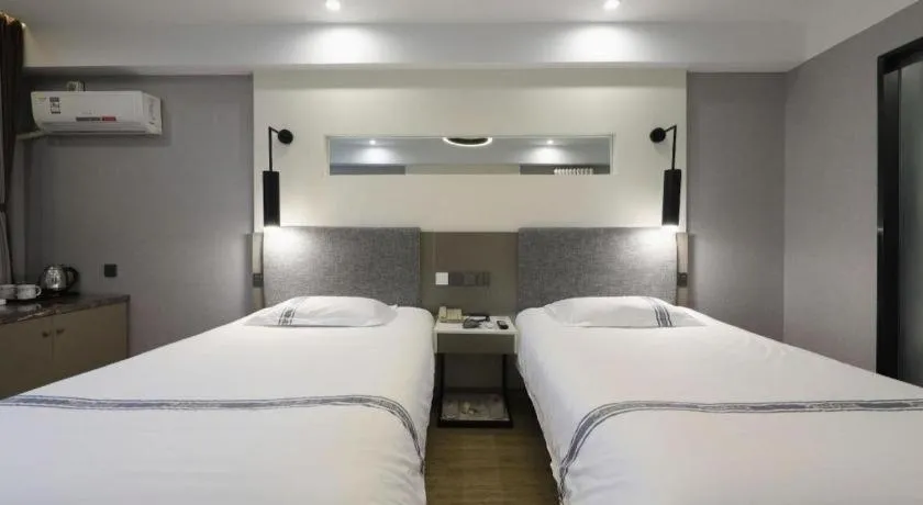 Bed in Urban Garden Hotel Chengyang District Government Liuting Airport