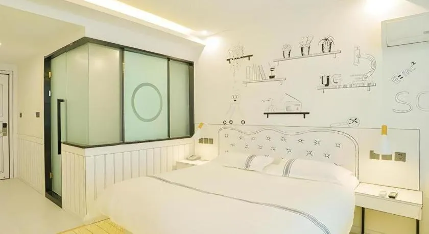 Bed in Urban Garden Hotel Chengyang District Government Liuting Airport