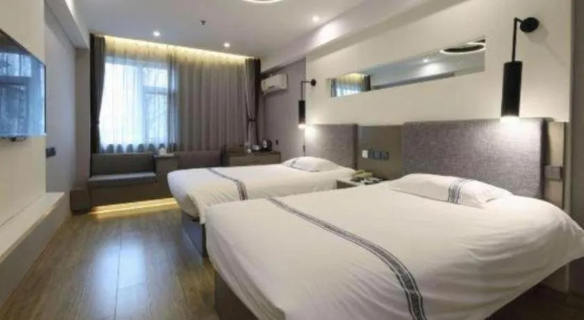 Bed in Urban Garden Hotel Chengyang District Government Liuting Airport