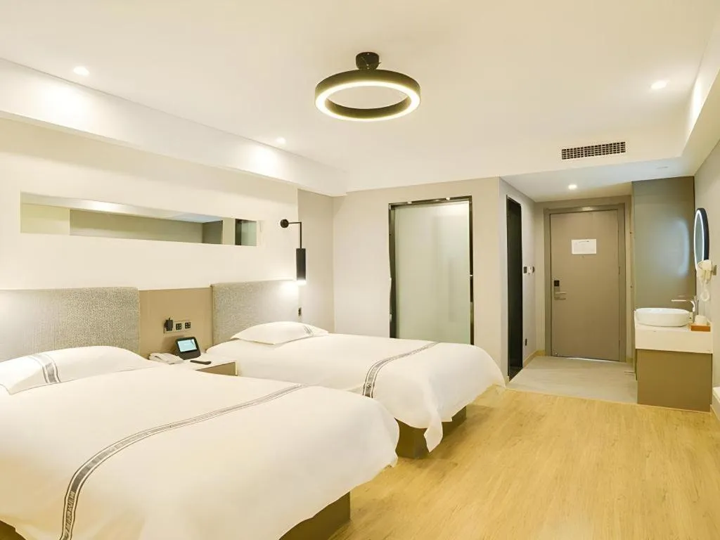 Bed in Urban Garden Hotel Chengyang District Government Liuting Airport