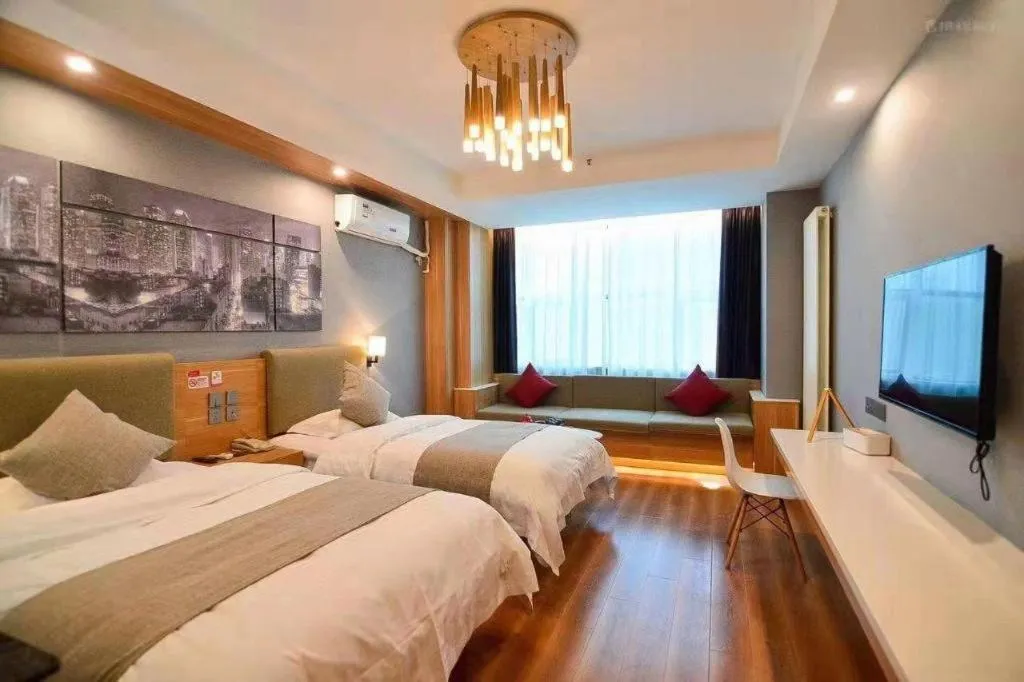 Bed in Urban Garden Hotel Chengyang District Government Liuting Airport