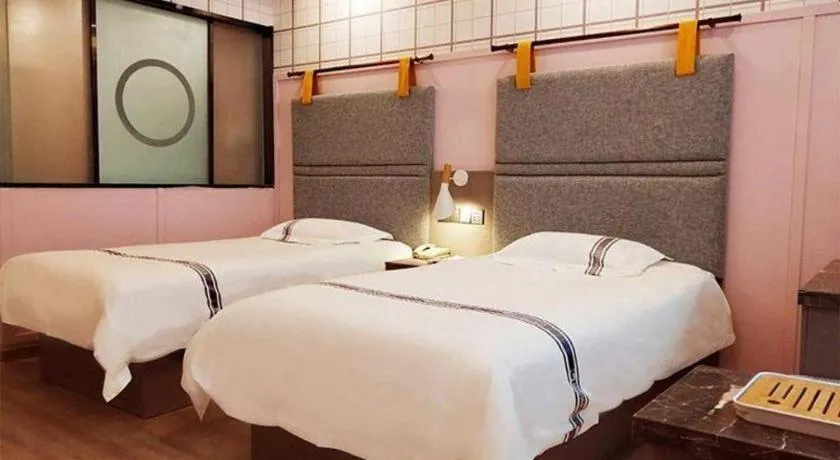 Bed in Urban Garden Hotel Chengyang District Government Liuting Airport