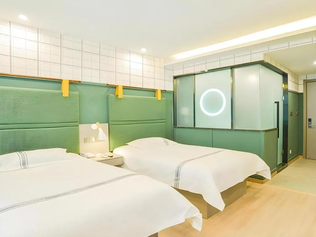 Bed in Urban Garden Hotel Chengyang District Government Liuting Airport