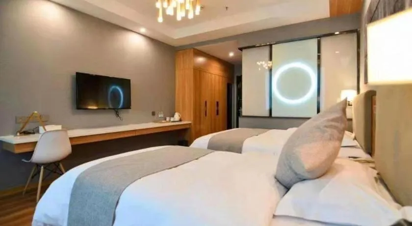 Bed in Urban Garden Hotel Chengyang District Government Liuting Airport