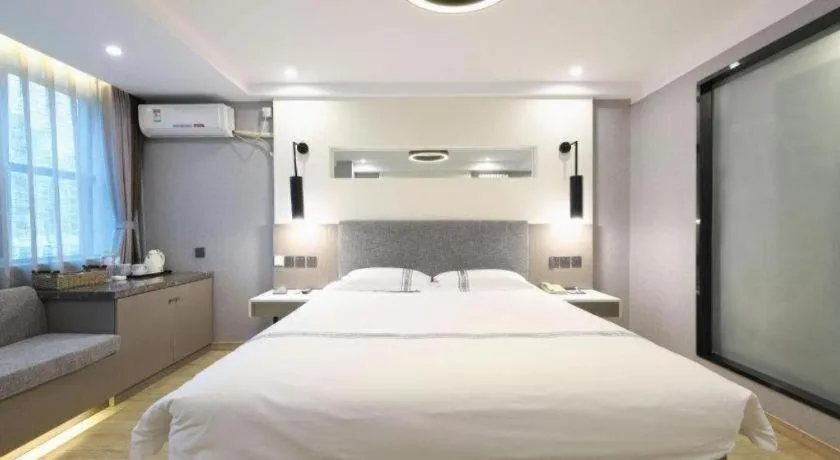 Bed in Urban Garden Hotel Chengyang District Government Liuting Airport