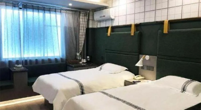 Bed in Urban Garden Hotel Chengyang District Government Liuting Airport