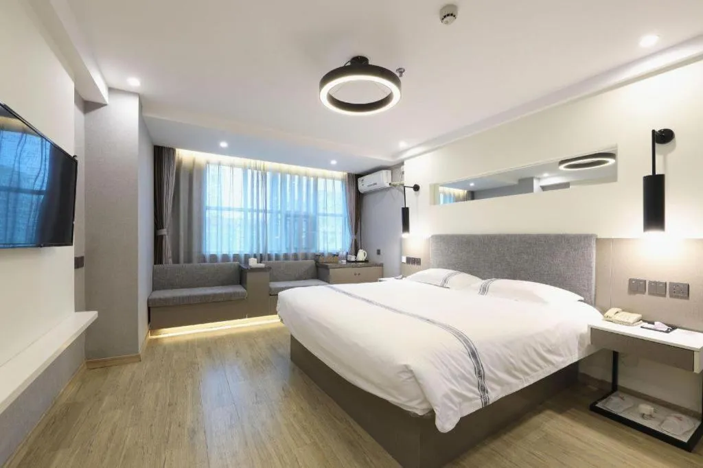 Bed in Urban Garden Hotel Chengyang District Government Liuting Airport