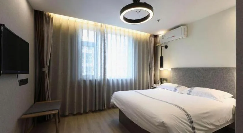 Bed in Urban Garden Hotel Chengyang District Government Liuting Airport