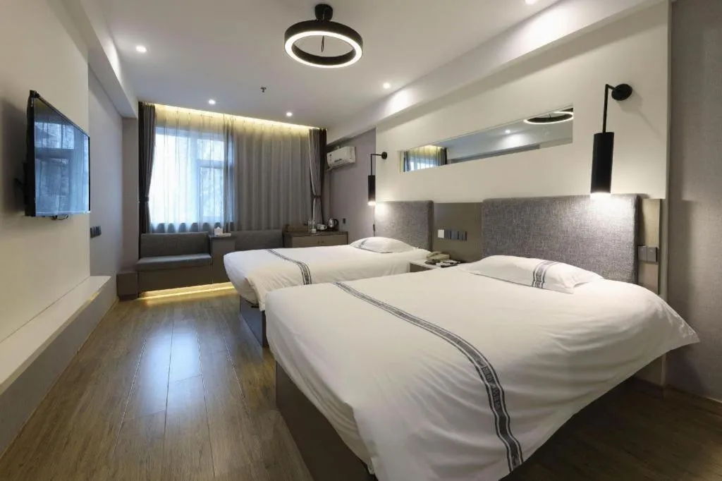 Bed in Urban Garden Hotel Chengyang District Government Liuting Airport