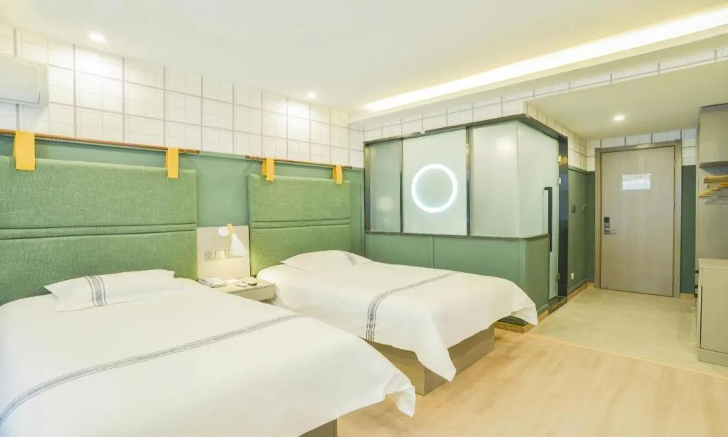 Bed in Urban Garden Hotel Chengyang District Government Liuting Airport