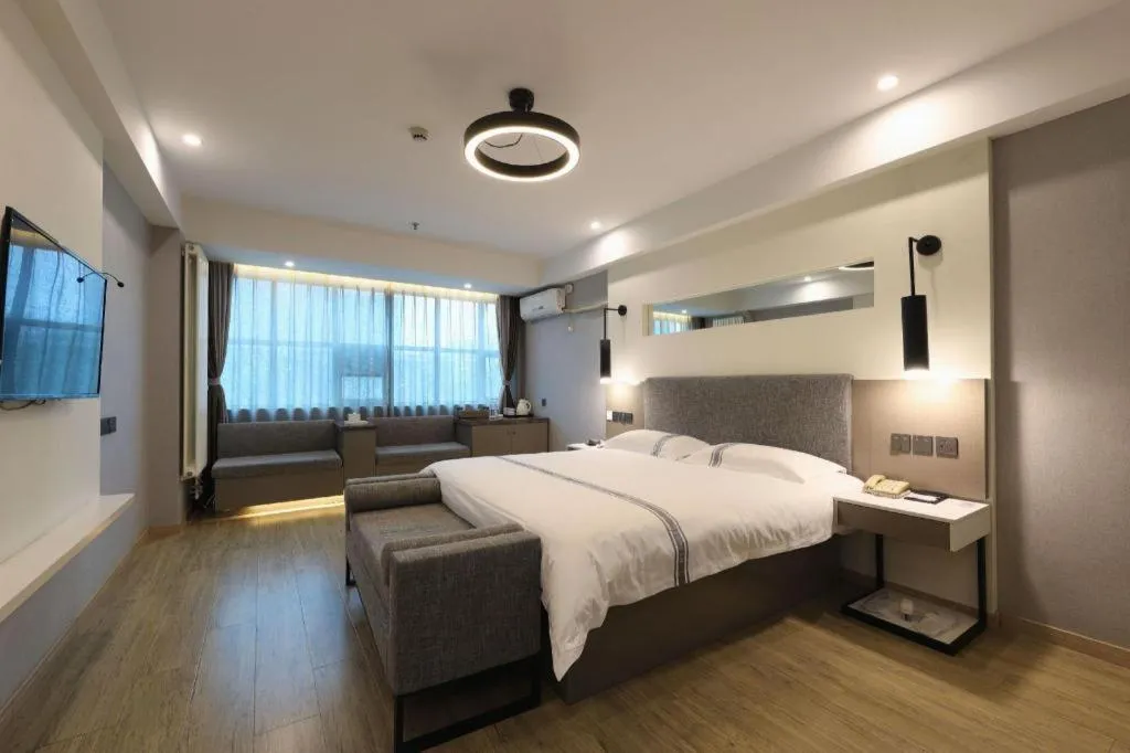 Bed in Urban Garden Hotel Chengyang District Government Liuting Airport