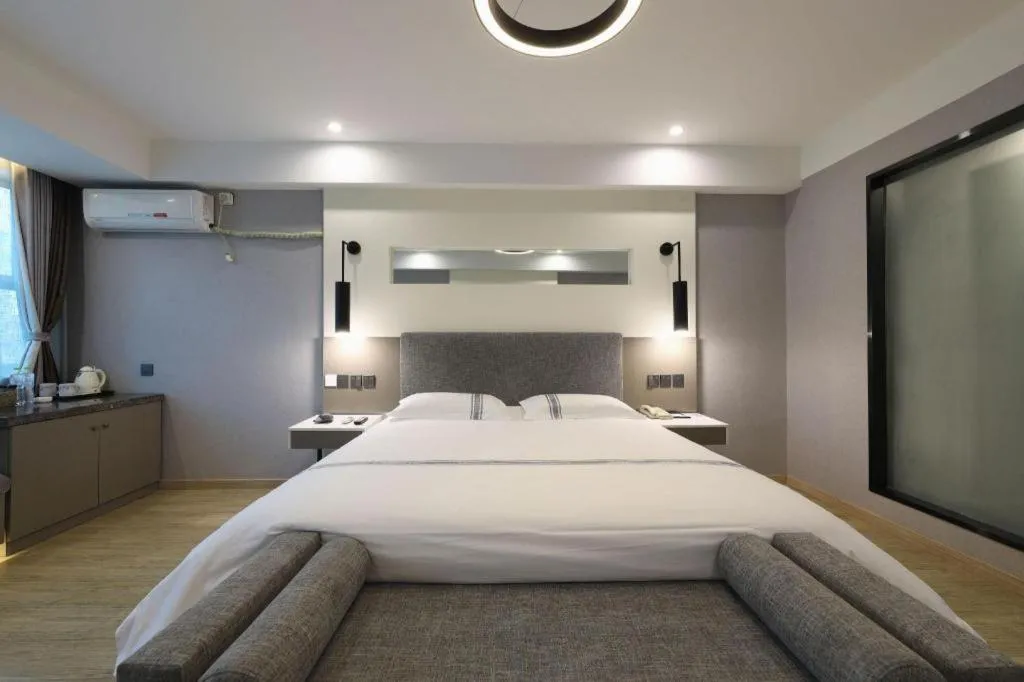 Bed in Urban Garden Hotel Chengyang District Government Liuting Airport