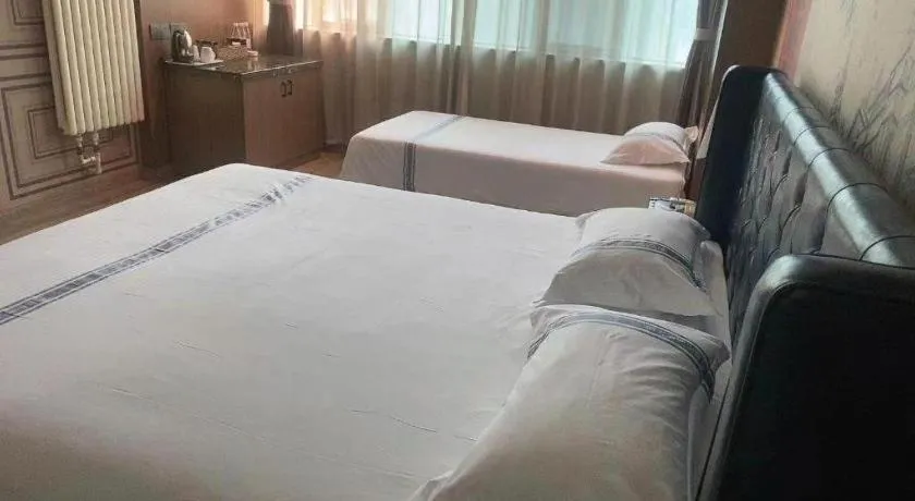 Bed in Urban Garden Hotel Chengyang District Government Liuting Airport