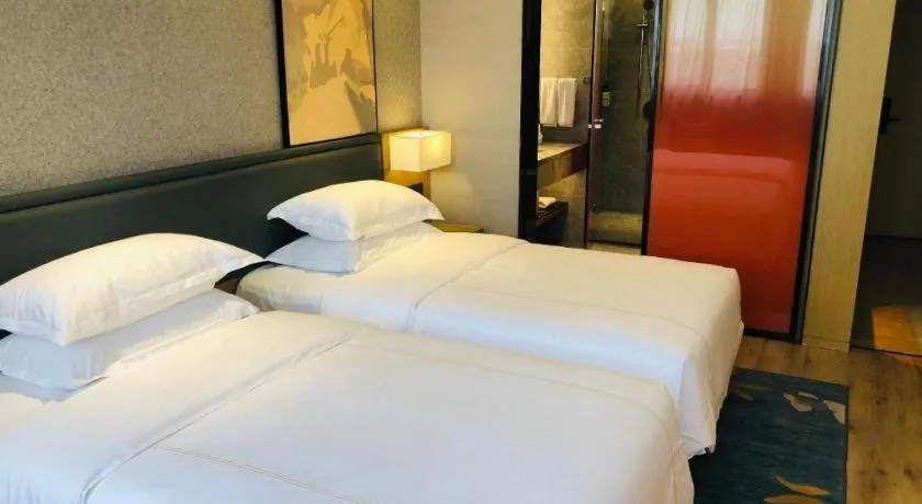 Bed in The Hotel V Nanjing Lishui