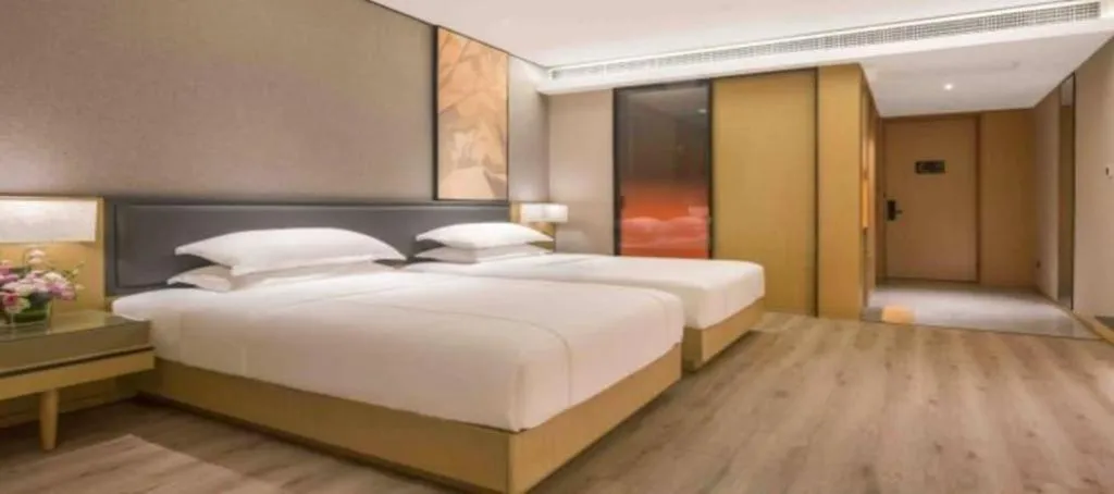 Bed in The Hotel V Nanjing Lishui