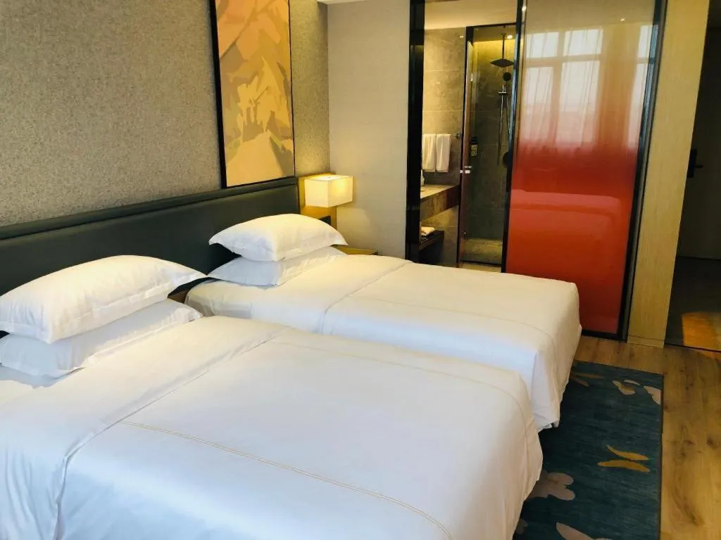 Bed in The Hotel V Nanjing Lishui