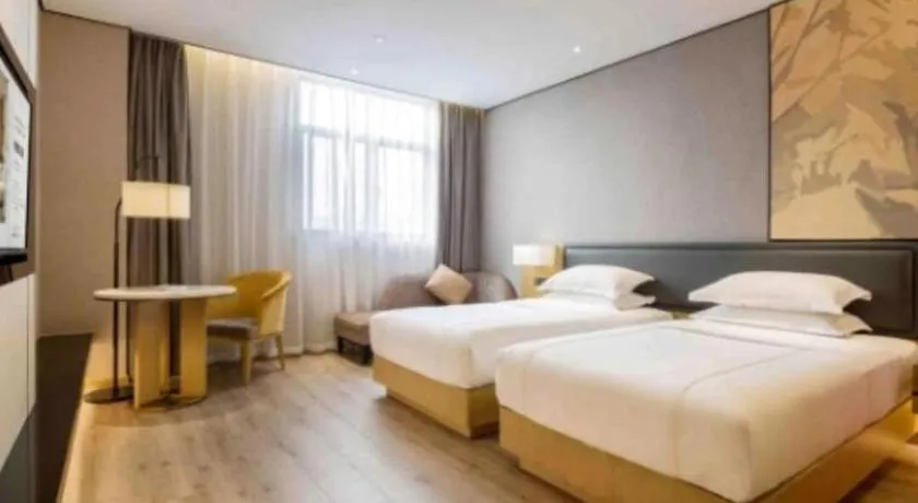 Bed in The Hotel V Nanjing Lishui