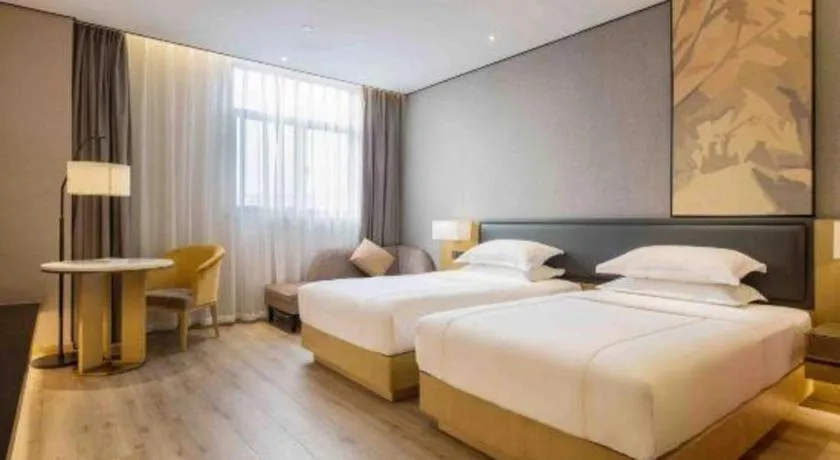 Bed in The Hotel V Nanjing Lishui