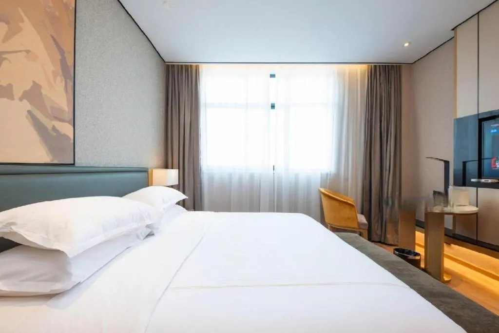 Bed in The Hotel V Nanjing Lishui