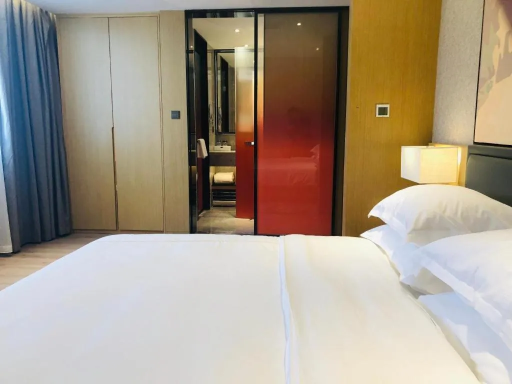 Bed in The Hotel V Nanjing Lishui