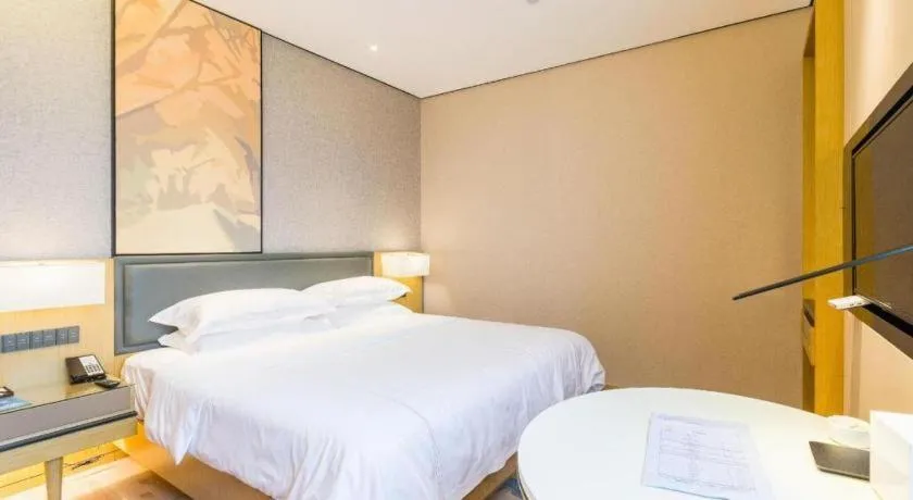 Bed in The Hotel V Nanjing Lishui