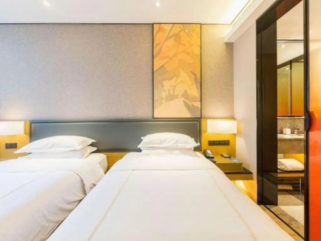 Bed in The Hotel V Nanjing Lishui