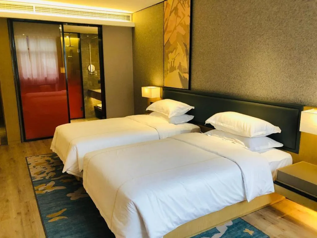 Bed in The Hotel V Nanjing Lishui