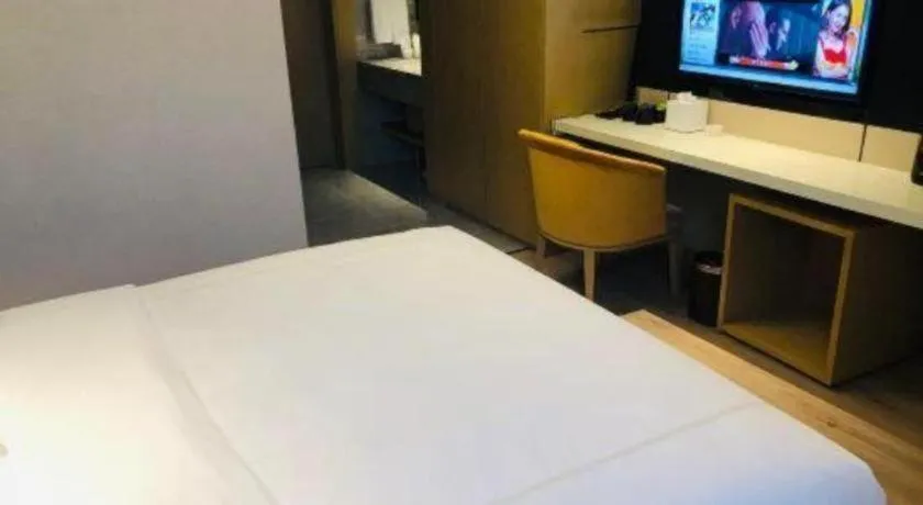 Bed in The Hotel V Nanjing Lishui