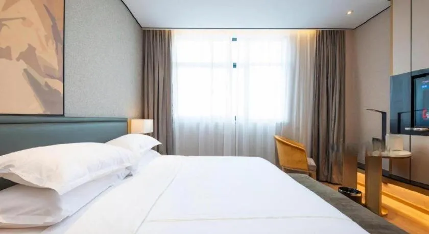 Bed in The Hotel V Nanjing Lishui