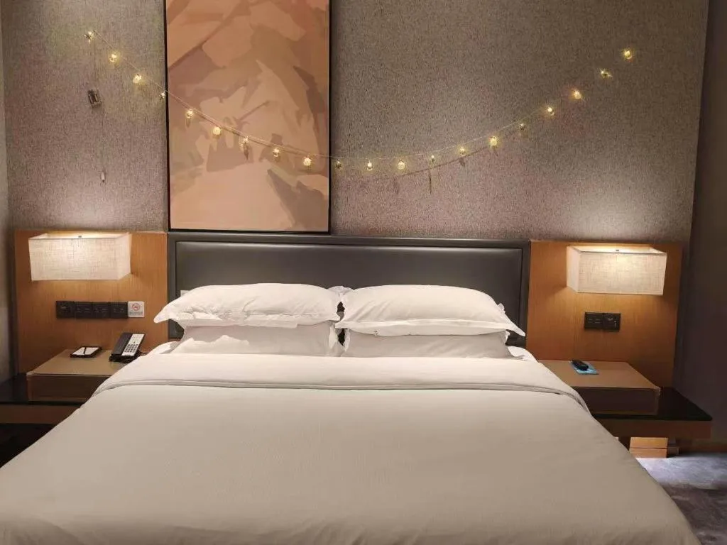 Bed in The Hotel V Nanjing Lishui