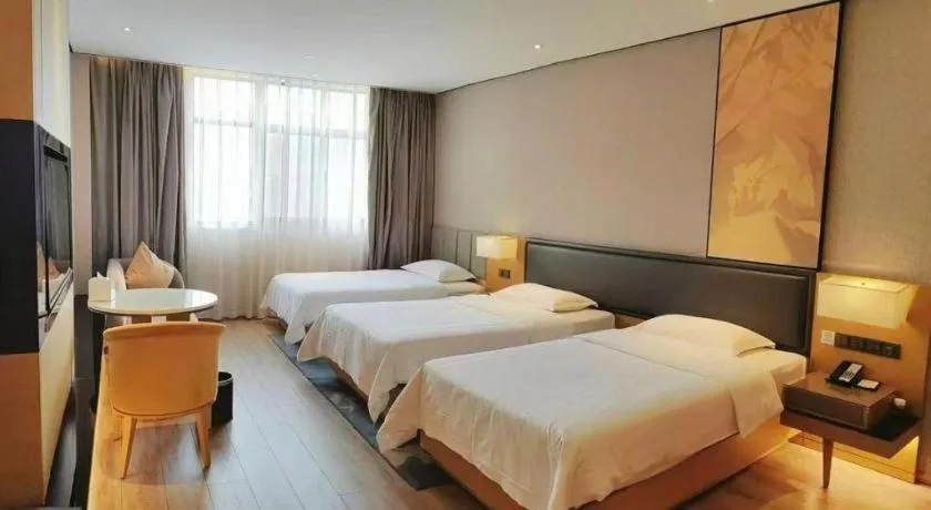 Bed in The Hotel V Nanjing Lishui