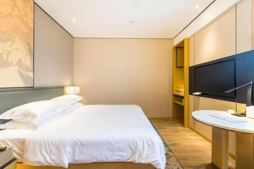 Bed in The Hotel V Nanjing Lishui