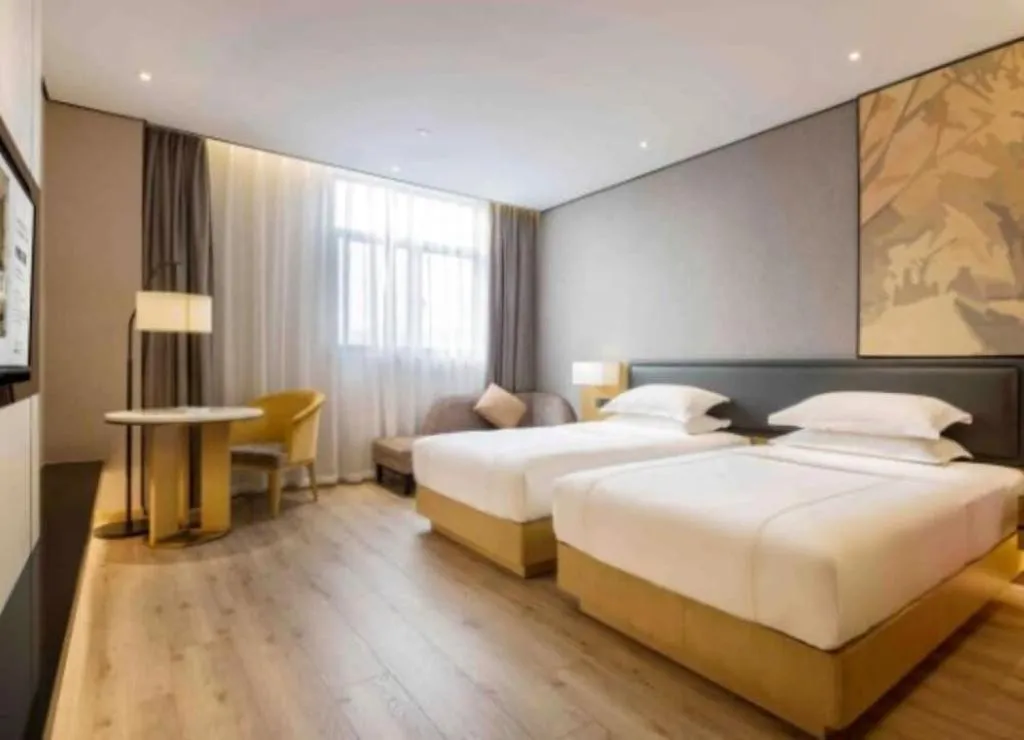 Bed in The Hotel V Nanjing Lishui