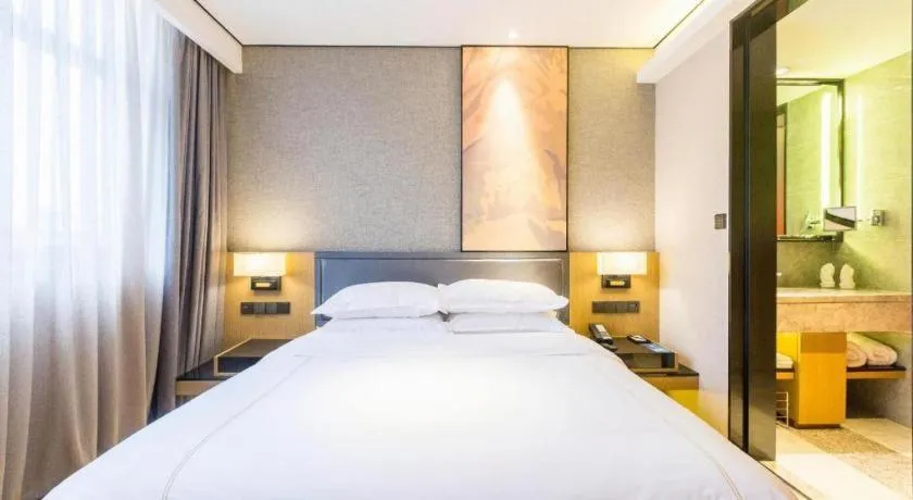 Bed in The Hotel V Nanjing Lishui