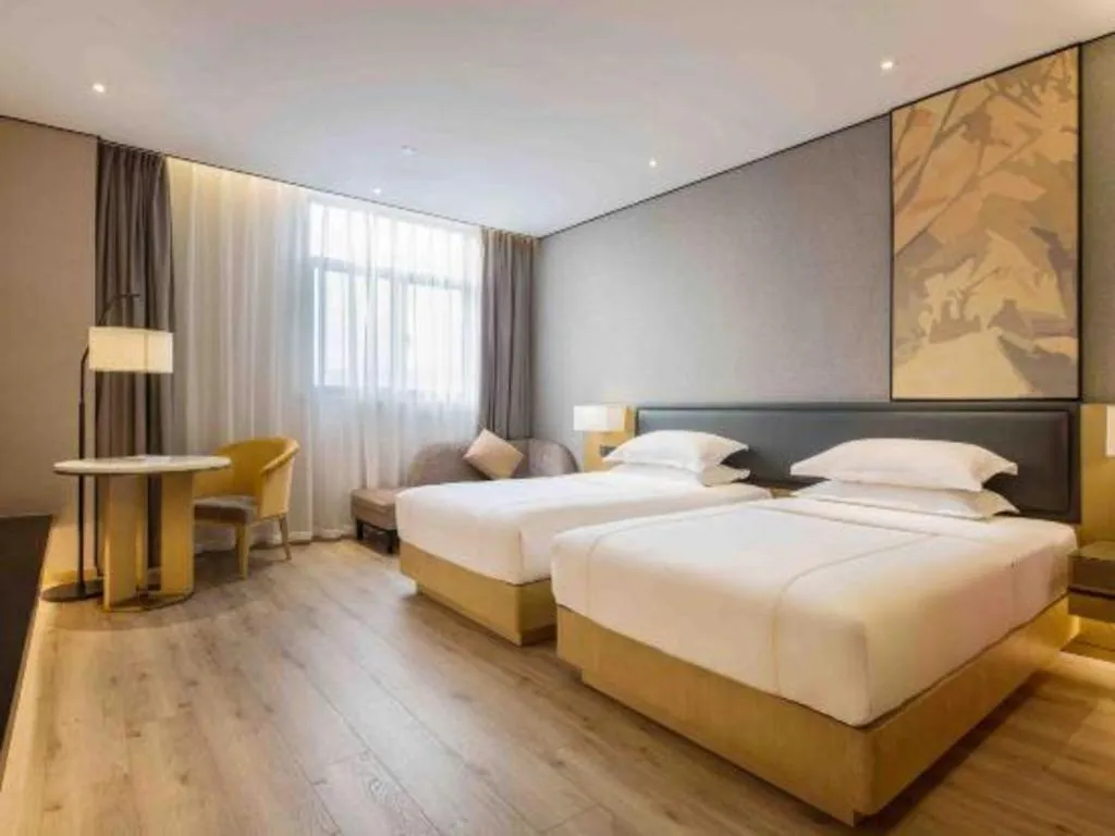 Bed in The Hotel V Nanjing Lishui