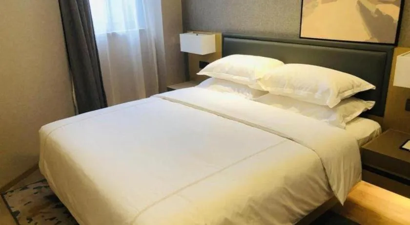 Bed in The Hotel V Nanjing Lishui